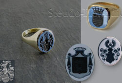 Verschiedene Wappengravuren in Lagenonyx. Erhältlich ist dieser Stein in 6 verschiedenen Farbabstufungen (obere Lage), hell bis dunkelblau.