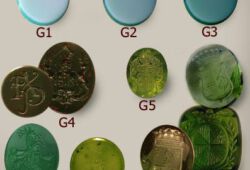 Lagensteine von hell bis dunkelgrün.G4 Heliotrope, G5 Peridot, G6 Grünachat, G7 Nephrit, G8 und G9 Turmaline
