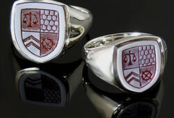 2 crestrings in silver set with layered carnelians and shield engravings